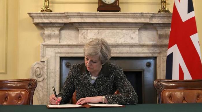 British PM May to fire starting gun on Brexit