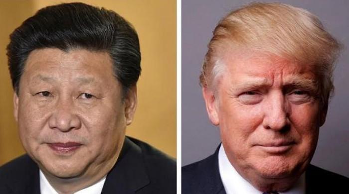 China downplays tensions with US as Xi prepares to meet Trump