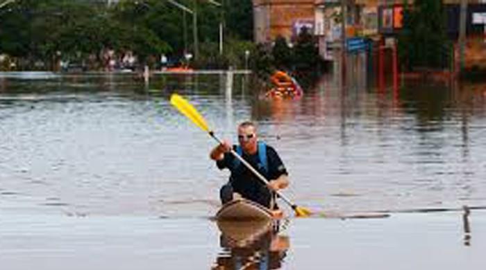 Australia floods still rising with two dead, four missing