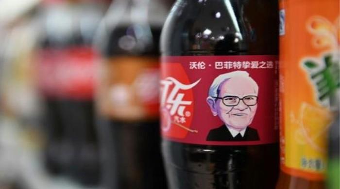 Billionaire Warren Buffet becomes face of Coke in China