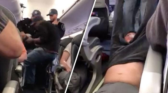 United passenger dragged off overbooked flight