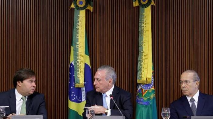 Brazil judge orders corruption probe into a third of Temer's cabinet