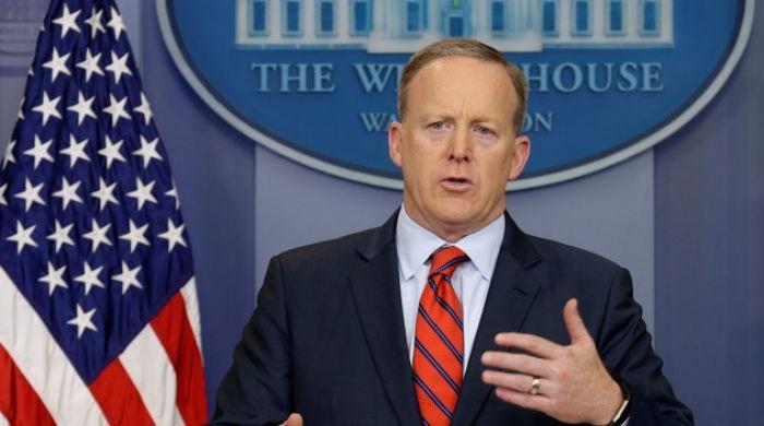 Trump aide offers fresh apology over Hitler reference