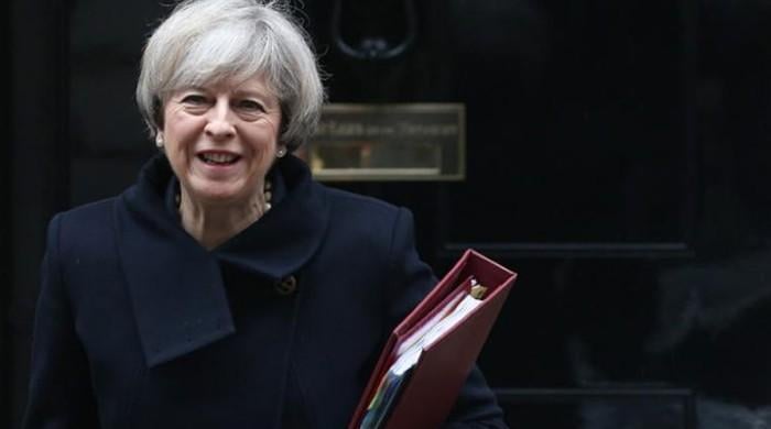 May criticised over snap general elections