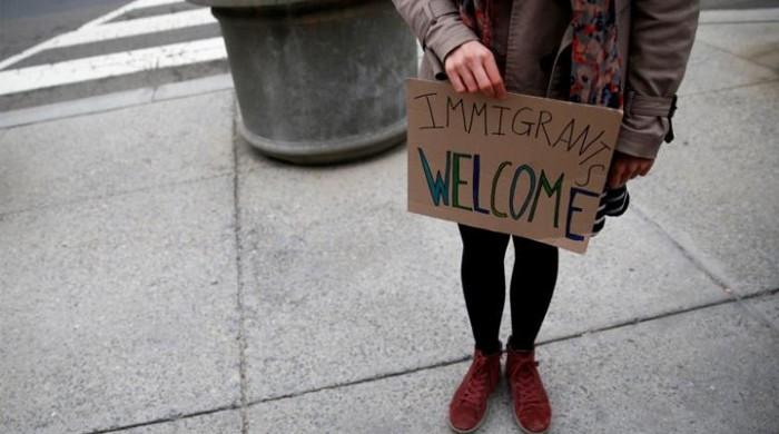 US states realign in legal battle over Trump's travel ban