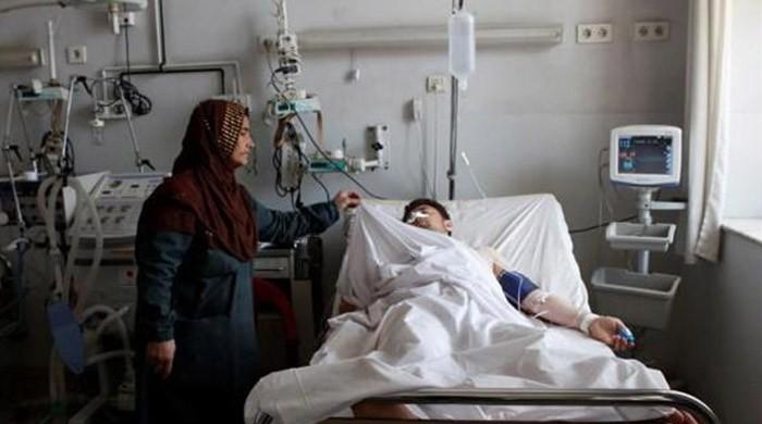 Death toll in Afghan base attack rises to 140, officials say