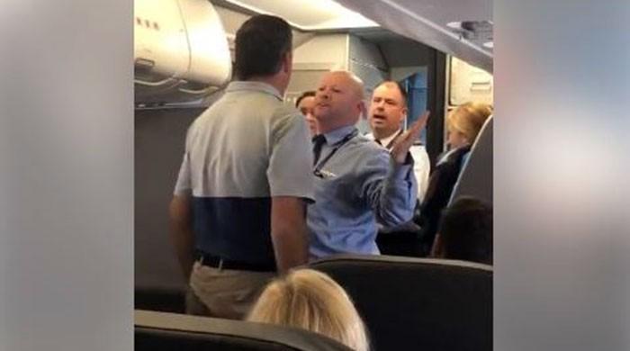American Airlines' employee suspended after row with passengers