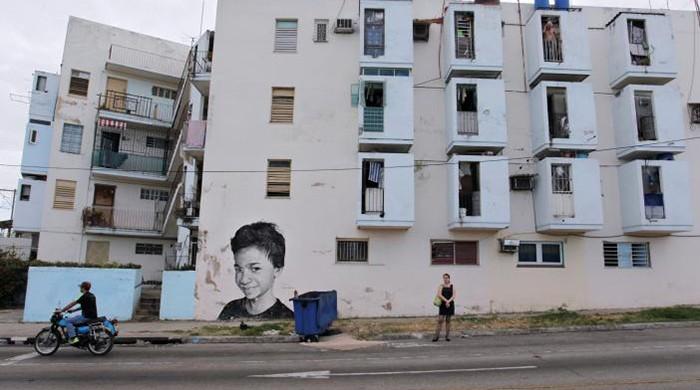 Havana walls brought to life with murals of wide-eyed children