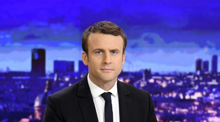 France's Macron says 'nothing's won yet'