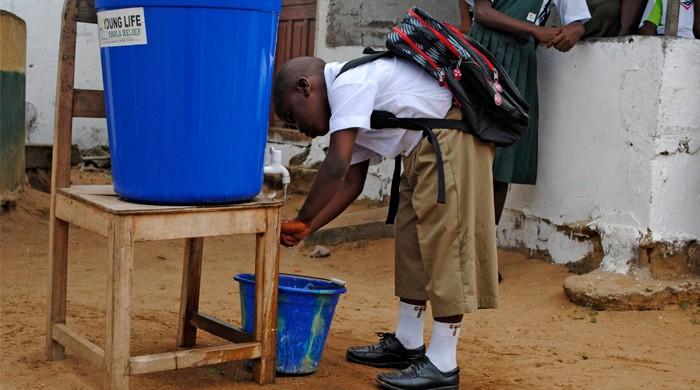 Mystery deaths in Liberia linked to funeral: WHO