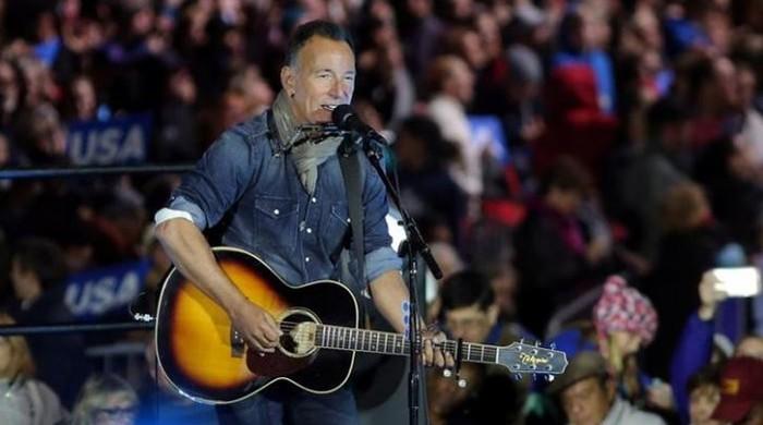 Springsteen recounts struggle to live outside bliss of rock songs