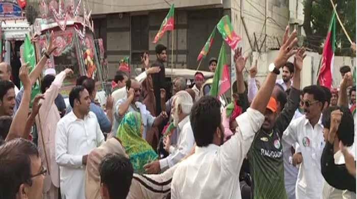 Image result for PML-N, PTI workers face off outside of Karachi Press Club