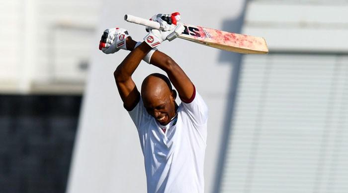 Ton-up Chase, Holder give West Indies edge