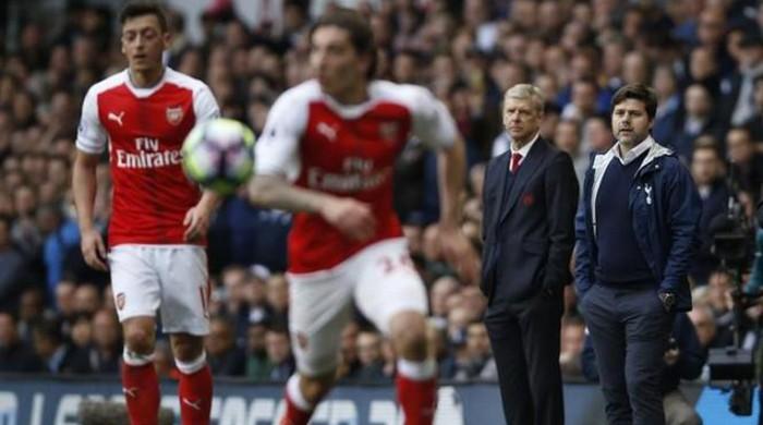 Spurs beat rivals Arsenal to keep up title challenge