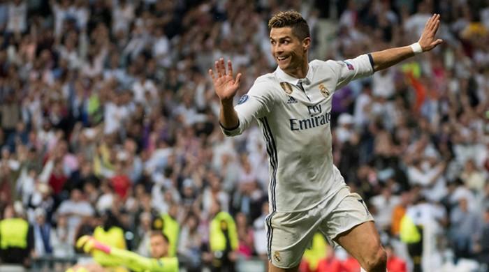 Ronaldo hat-trick leaves Real on verge of final