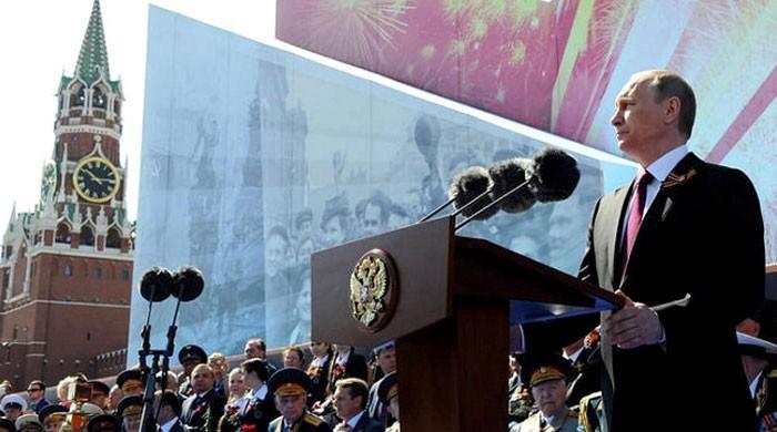 Putin urges world to fight terror as Russia marks WWII victory