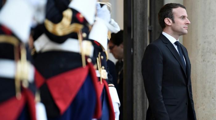 Macron blurs party lines with mixed French cabinet