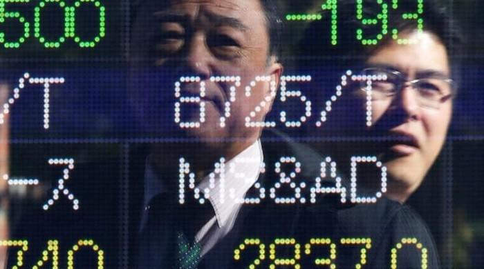 Asia falls as White House turmoil hits risk sentiment, dollar bruised