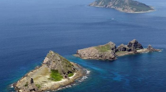 Japan protests to China over drone flight near disputed islets