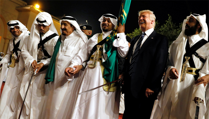 Wielding swords, Trump, US officials sway to tunes of Arabian ardha dance