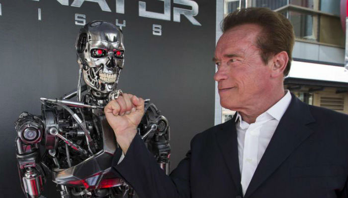 Schwarzenegger says you can have four Hummers and still save planet