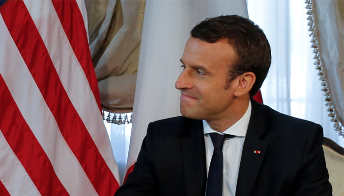 French president Macron trumps Trumps tug-and-hold handshake