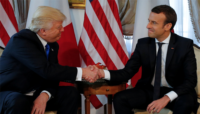 French president Macron trumps Trumps tug-and-hold handshake