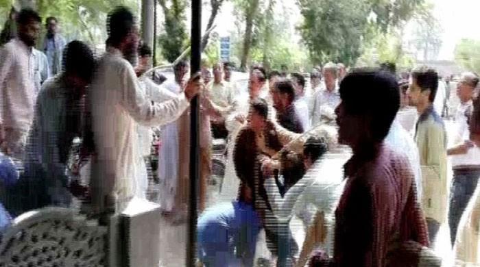 Unpaid salaries: Enraged vaccinators turn health dept office into battlefield in Faisalabad  