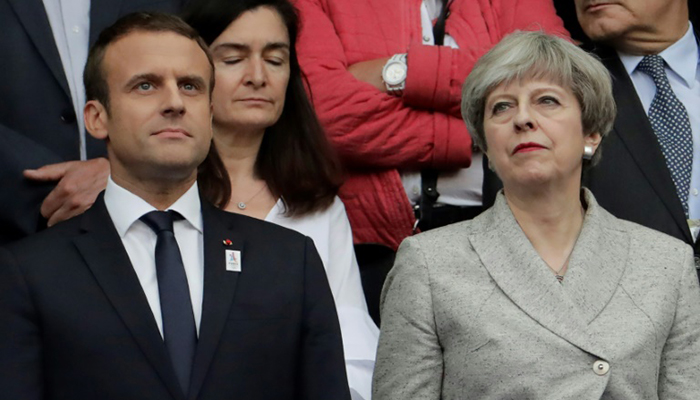 France honours terror victims as Macron, May attend England friendly
