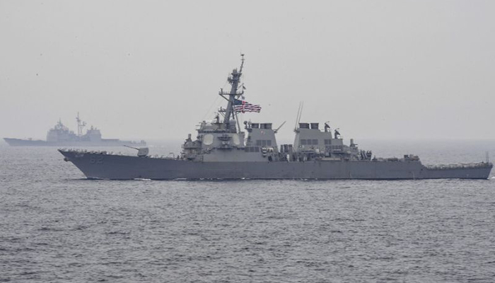 Seven US Navy crew missing as ship crashes into merchant vessel