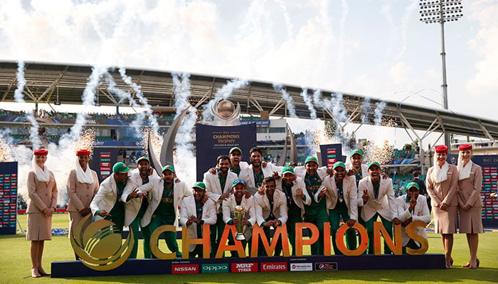 Pakistan players lift the trophy to celebrate their win at the presentation after the ICC Champions Trophy final cricket match between India and Pakistan at The Oval in London on June 18, 2017.