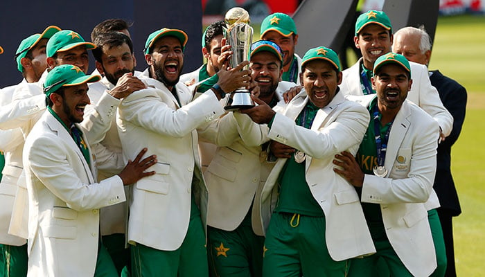Pakistan players lift the trophy to celebrate their win at the presentation after the ICC Champions Trophy final cricket match between India and Pakistan at The Oval in London on June 18, 2017.