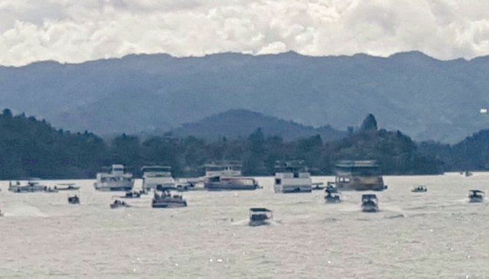 Boat in Colombia carrying 150 tourists goes down in reservoir: air force