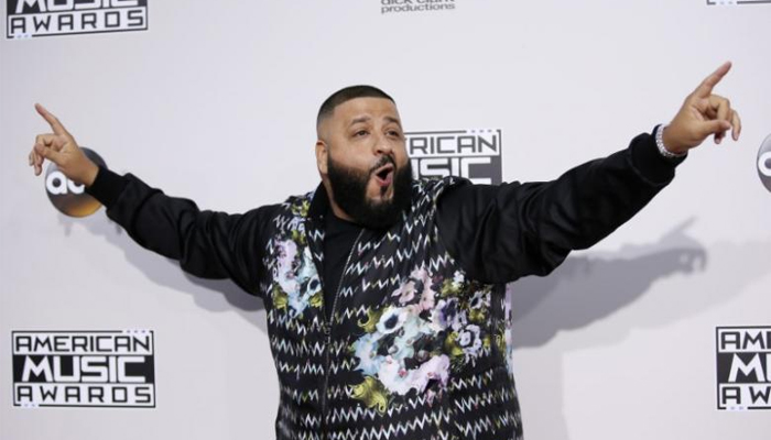 DJ Khaled, once in background, scores another No. 1 album