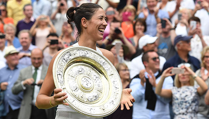 Muguruza stuns Venus to win first Wimbledon title