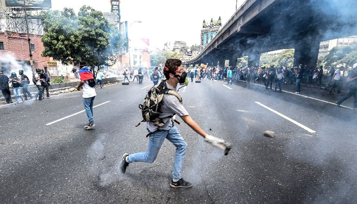 Venezuelan police break up anti-government rally with tear gas