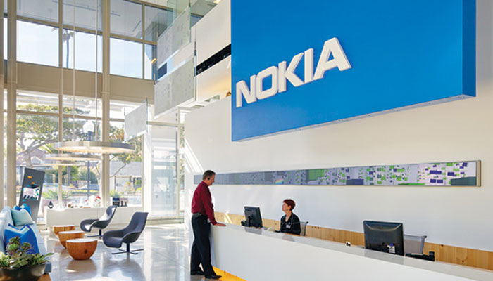 Nokia beats quarterly market forecasts but lowers networks outlook