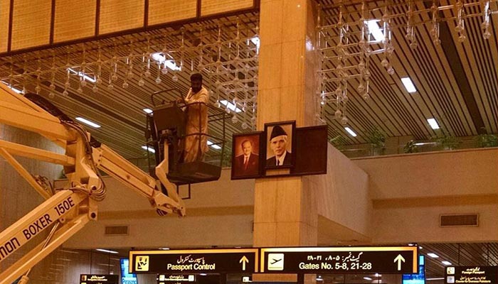 Nawaz’s picture removed from airport, name from NA website