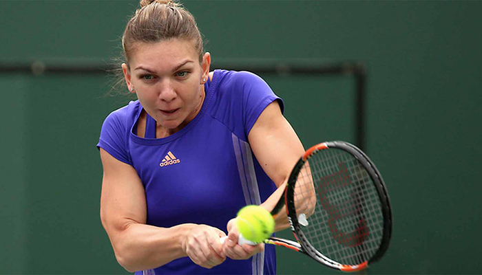 Severe heat ends Halep's run while Raonic falls