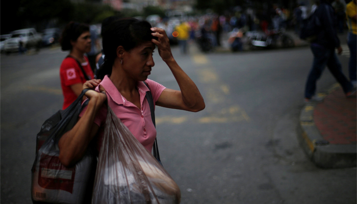 Venezuela trembles under price surge amid new US sanctions