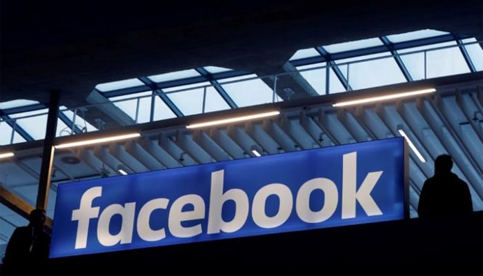 The Facebook logo is seen at a start-up companies gathering at Paris Station F France