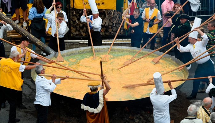 Visitors flock to Belgium's giant omelette festival despite scandal