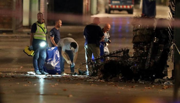 Barcelona death toll rises to 14; Spanish police shoot five suspects dead