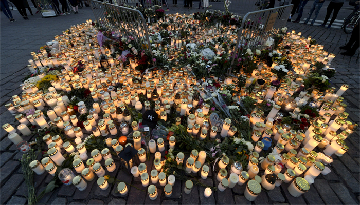 Finnish police search new sites, talk to suspect in knife rampage probe