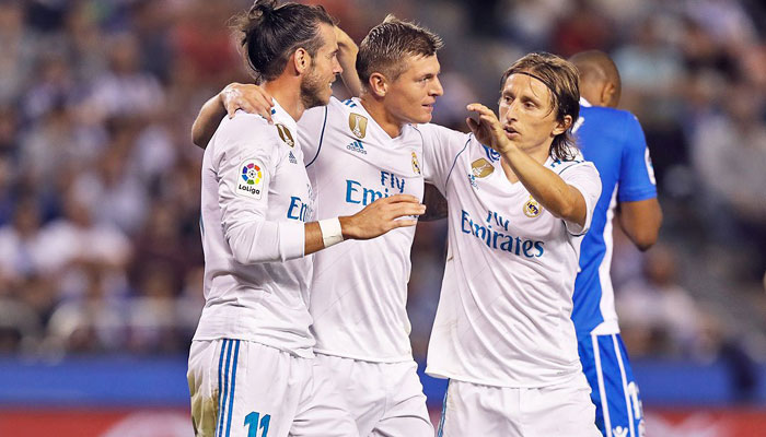 Real Madrid ease past Deportivo in La Liga opener