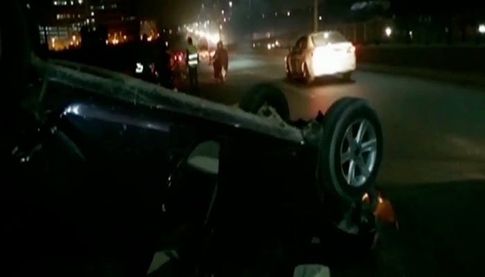 At least two left injured after car topples over near Kot Lakhpat in Lahore