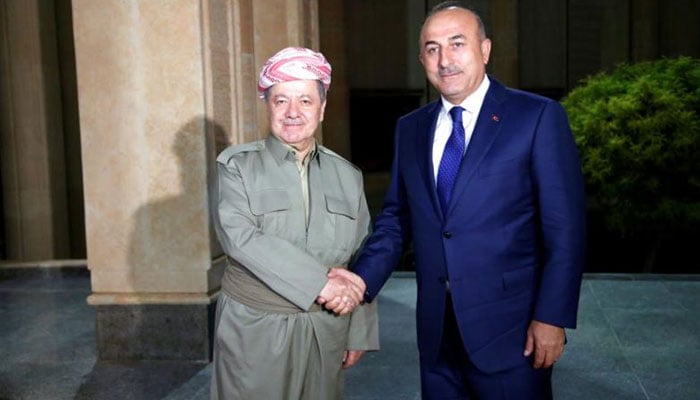Turkey's Foreign Minister Mevlut Cavusoglu meets with Iraq's Kurdistan region's President Massoud Barzani in Erbil Iraq