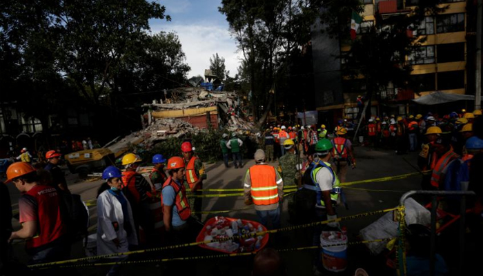 Tempers fray in desperate search for survivors days after Mexico quake
