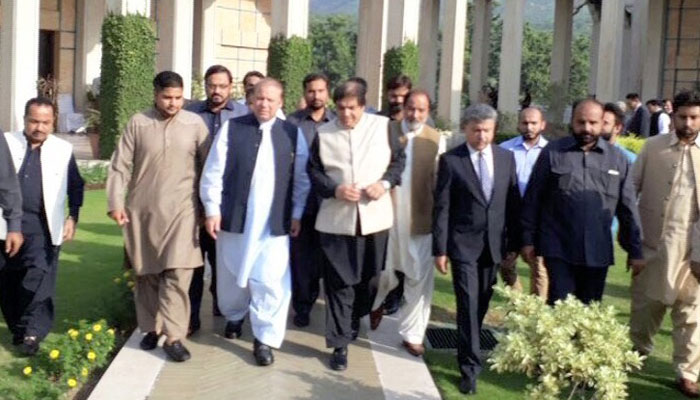 Former Prime Minister Nawaz Sharif leaving Punjab House to reach Accountability Court. Photo: Geo News