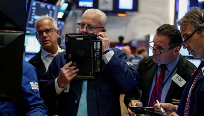 Wall Street recedes from highs as quarterly reports loom